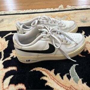 Nike White Sneakers with Black Accents